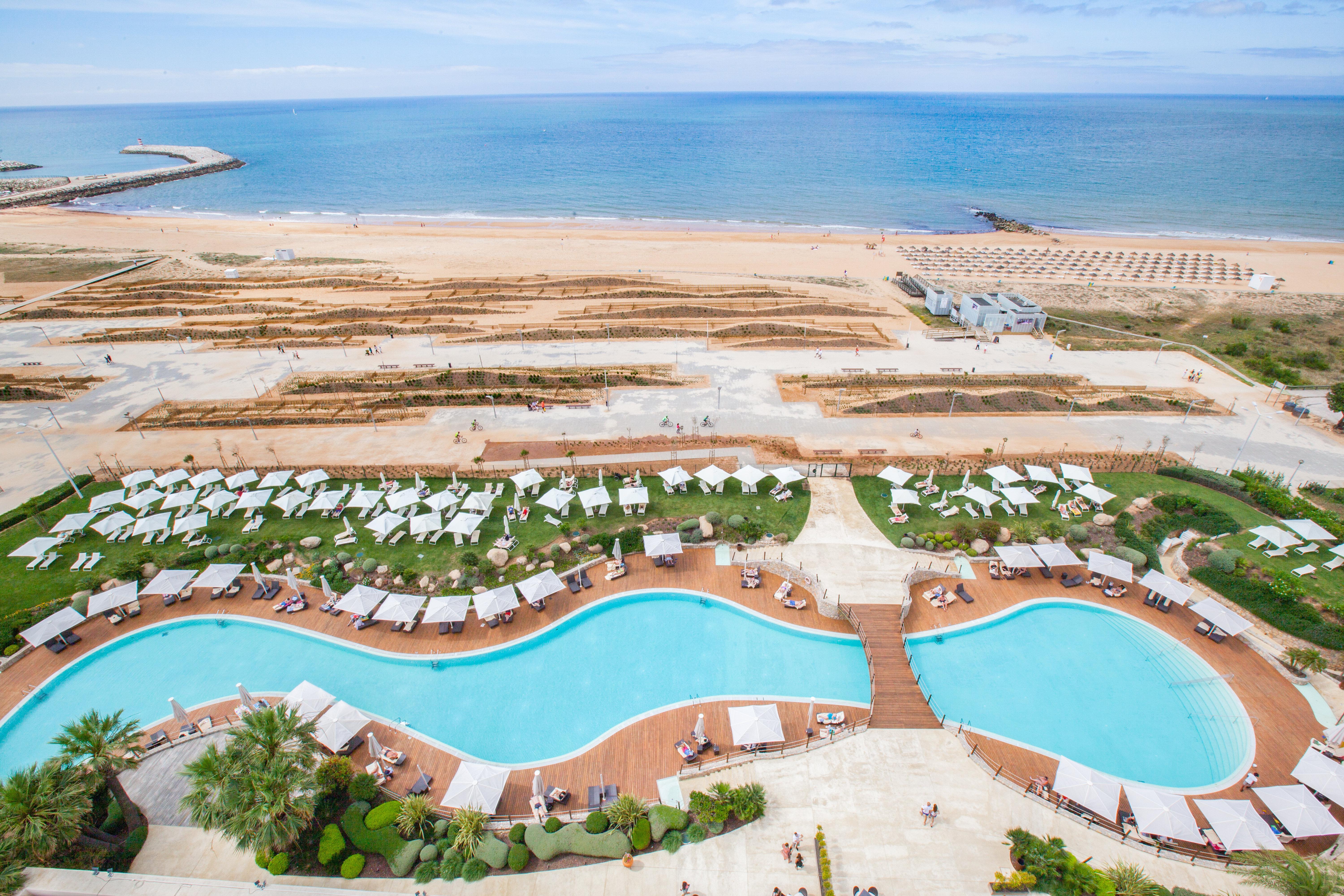 คราวน์ พลาซา วีลาโมวรา Hotel วิลาโมรา ภายนอก รูปภาพ The beach of the hotel
